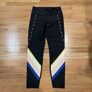NWOT PE Nation Activewear  Leggings Black yellow, white, peach, and blue.  ( m)